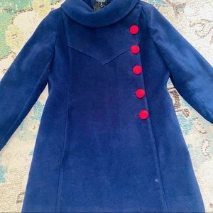 ModCloth retro coat. Tag says 14 , I wear a small petite and it fits me.